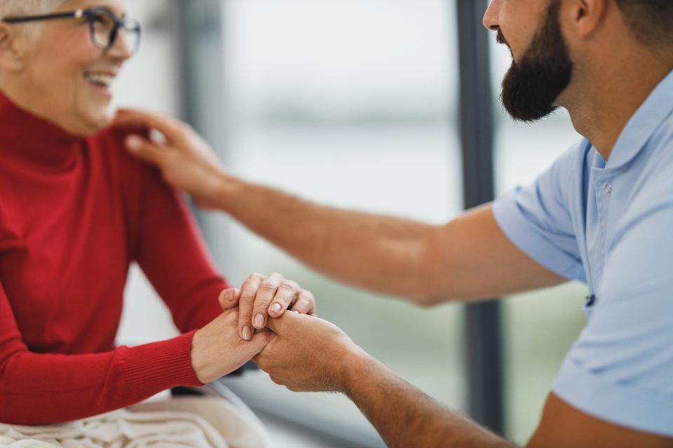 Close-up of caring hands held together in support