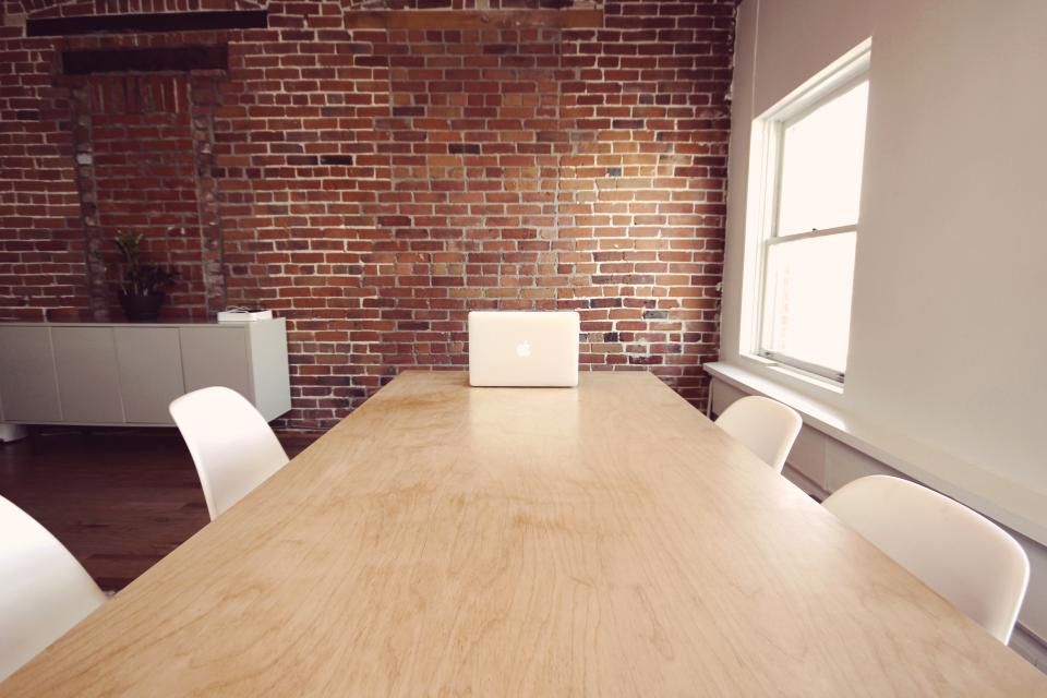 Conference room meeting about practice revenue cycle workflow